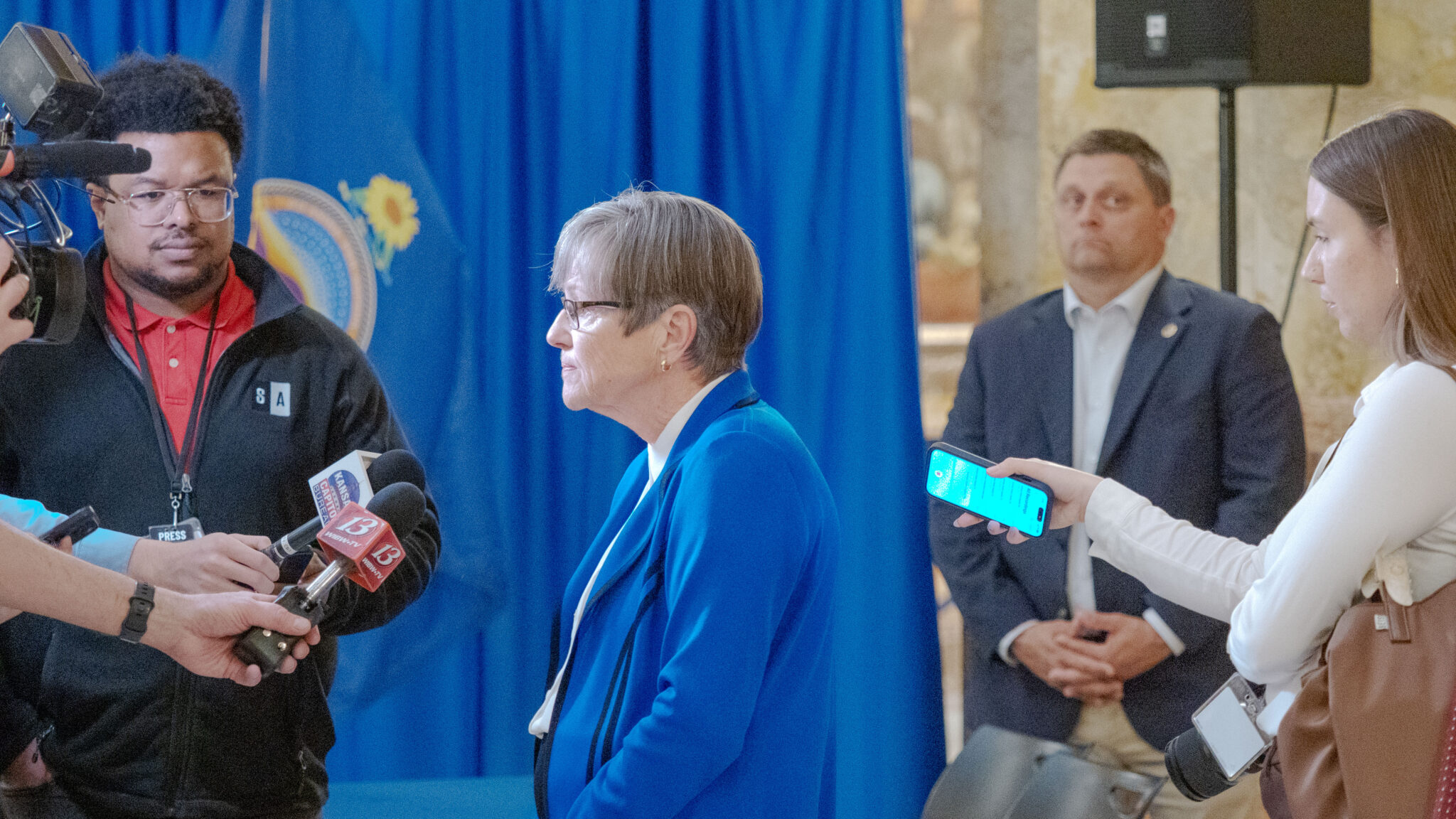 Gov. Laura Kelly speaks with reporters at the Statehouse. File photo, March 31, 2026.