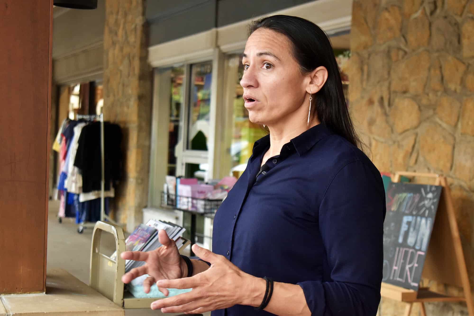 Rep. Sharice Davids speaks with reporters outside The Shops of Prairie Village. File photo, August 2026.